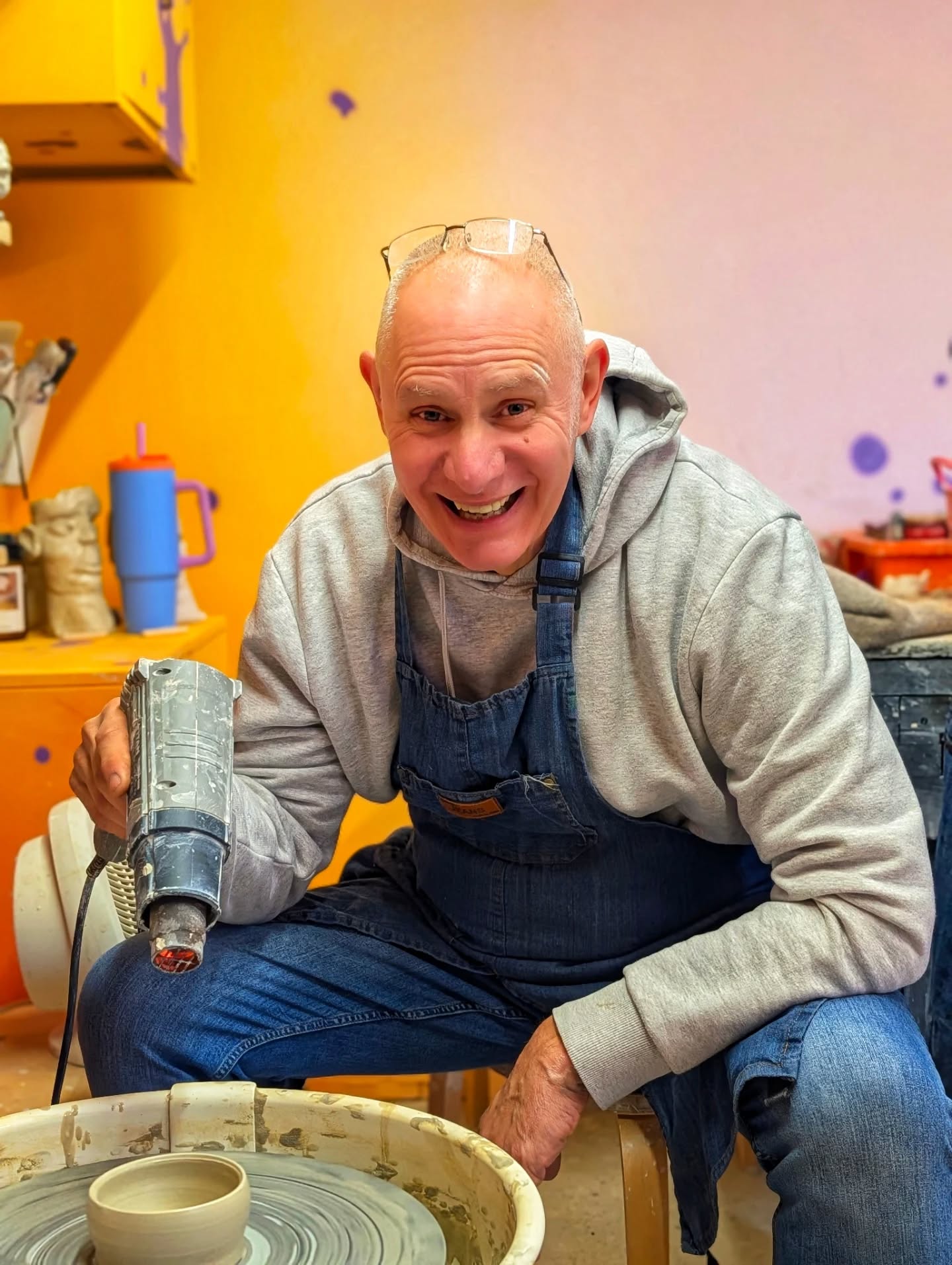 Student at the pottery wheel during a private 1-to-1 lesson at Ceramic Love